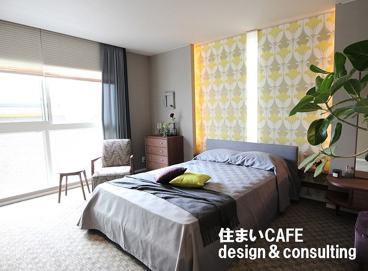 透明ガラスの窓の寝室の施工例